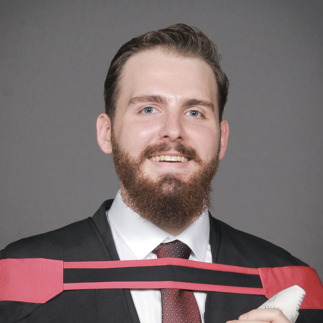 Warwick Brown, who runs ProperPics, in his Wits graduation gown.